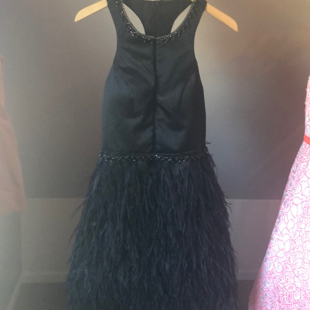 Black feather and beaded cocktail dress